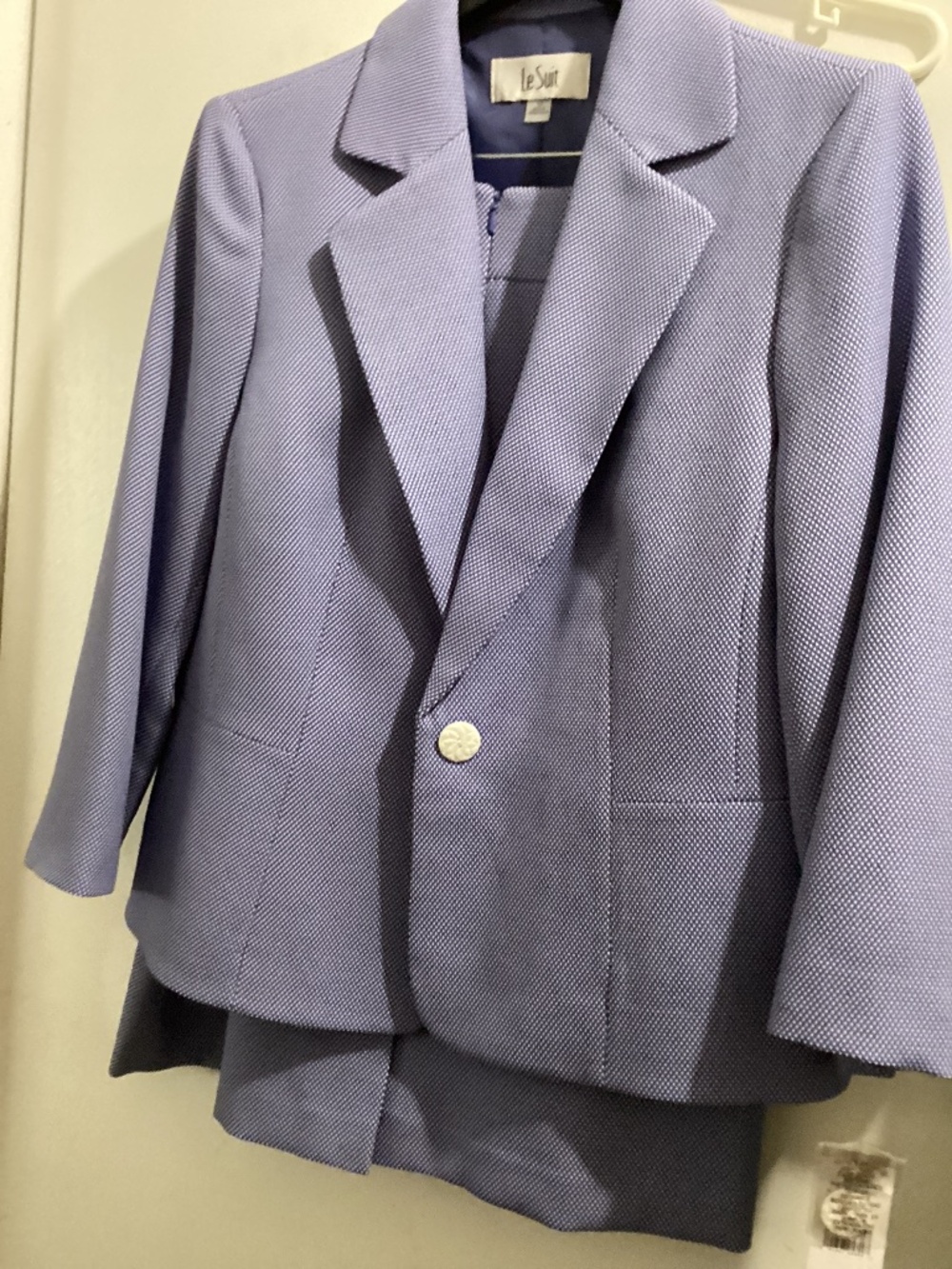 Le Suit 2 piece suit, jacket and skirt.